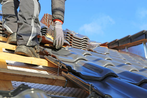 istock Roofing work, new covering of a tiled roof 1338823615