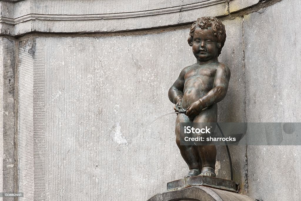 Model Pis The Mannekin Pis in Brussels, Belgium is a famous statue of a urinating boy. Mannekin Pis Stock Photo