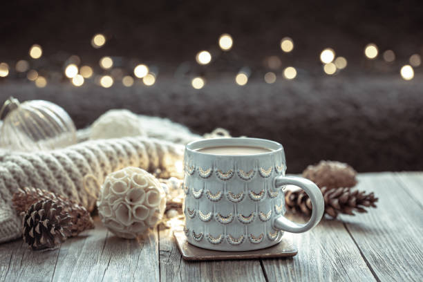 istock Home winter composition with coffee cup and decor details on blurred background. 1338830700