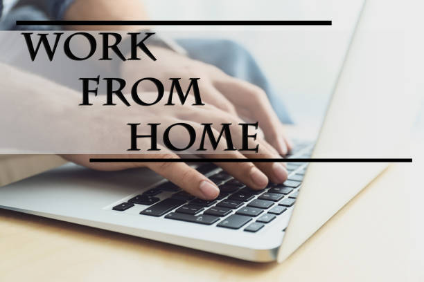 istock Man using modern laptop at wooden table indoors, closeup. Work from home 1338830758