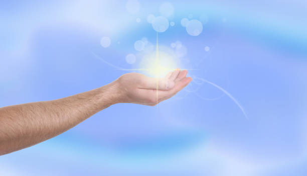 istock Man holding concentrated healing energy in his hand, closeup 1338831206