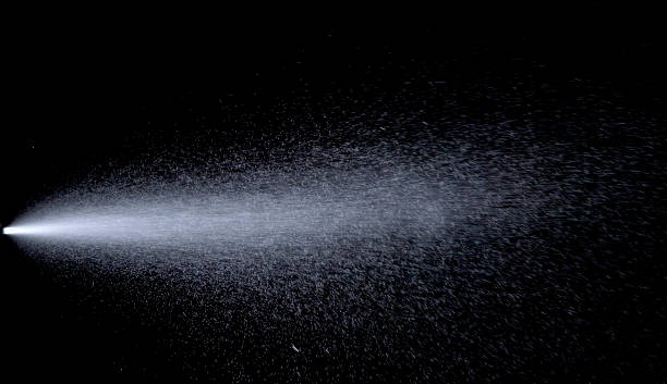 istock Water jet spraying on black background 1338831250