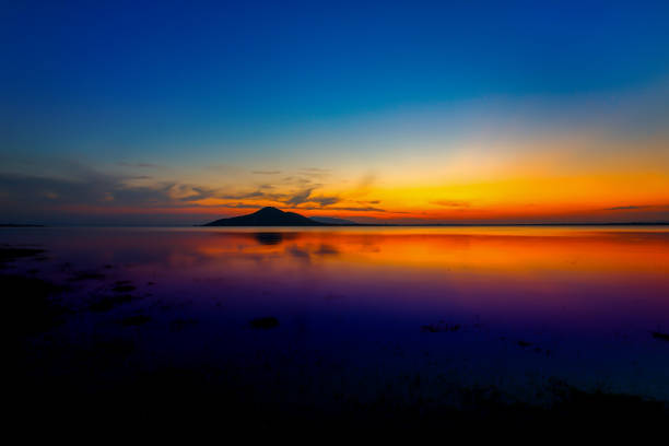 Sunset river sky clouds landscape. River sunset horizon view. Sunset river landscape. River sunset view