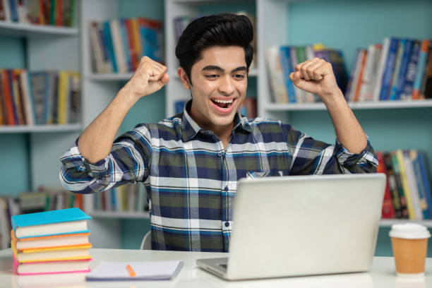 young student - stock photo - alleen één tienerjongen stockfoto's en -beelden