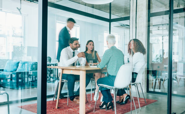 istock Team of professionals during a meeting. 1338845451