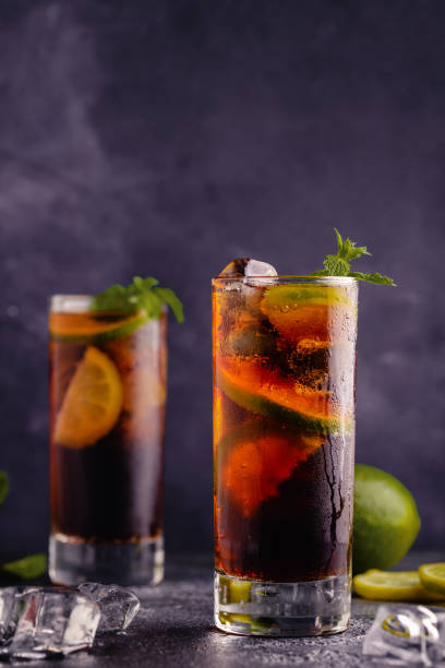 Rum and Cola cocktail Cuba Libre Rum and Cola cocktail Cuba Libre with lime and ice 1528 stock pictures, royalty-free photos & images