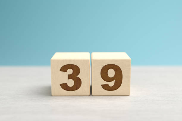 istock Wooden toy blocks forming the number 39. 1338847232