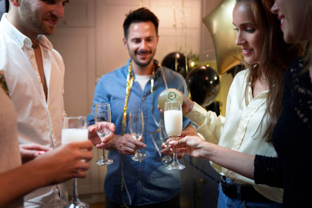 istock Friends drinking champagne on the party 1338849502
