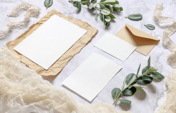 istock Wedding blank cards on a marble table with eucalyptus branches 1338851743