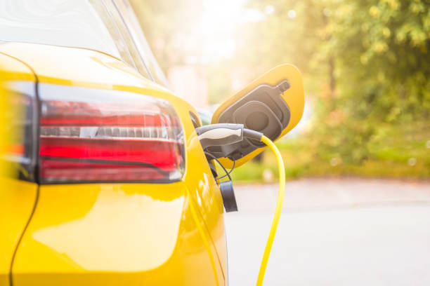 Recharging electric car stock photo