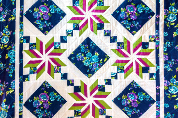 istock The patchwork bedspread is made of multi-colored pieces of fabric. 1338855795