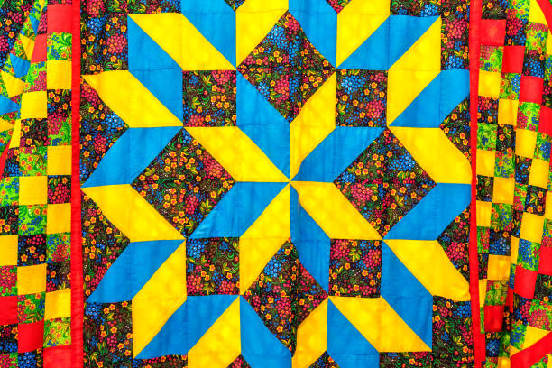istock The patchwork bedspread is made of multi-colored pieces of fabric. 1338855798
