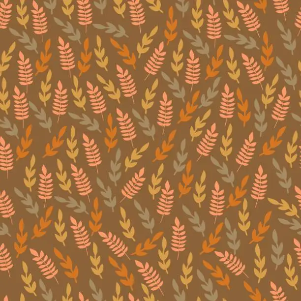 Vector illustration of autumn leaves seamless pattern on the braun background