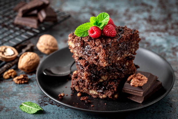 istock Brownie cake slices on a dark background 1338858947