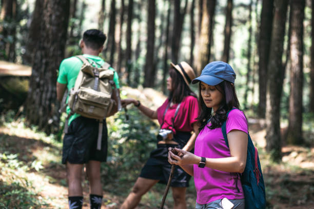 istock man and woman walking on the trail 1338858949