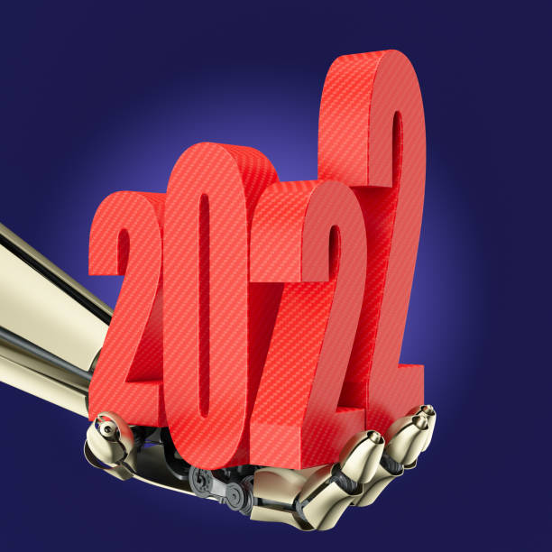 istock Robot's Hand Holding Red 2022 . New Year Concept 1338859134