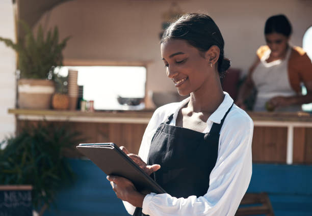 istock Shot of a businesswoman using her digital tablet at work 1338861625