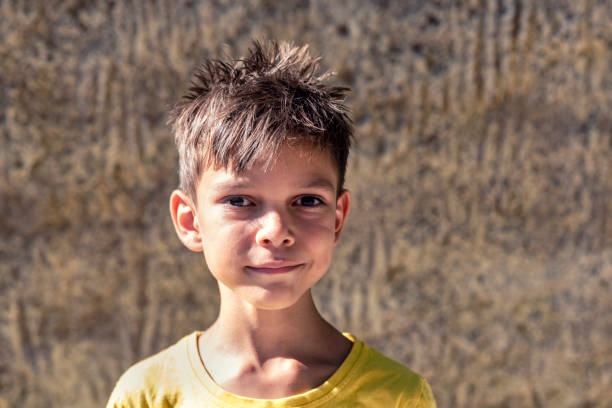Portrait of little boy lookingat camera