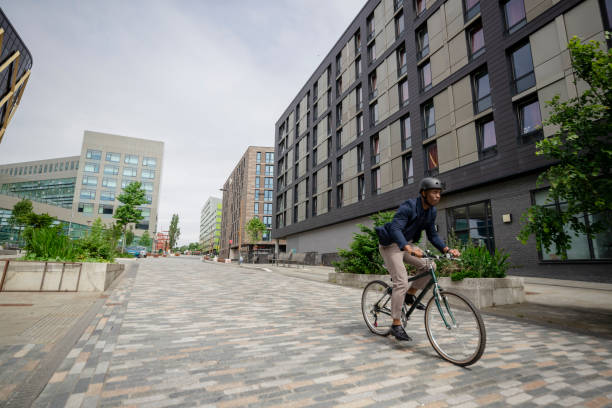 Commuting Businessman Riding His Bicycle in the City