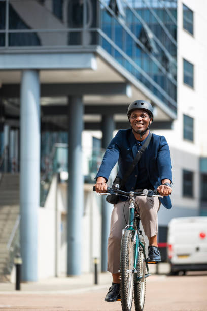 istock Commuting Businessman Cycling to Work 1338862757
