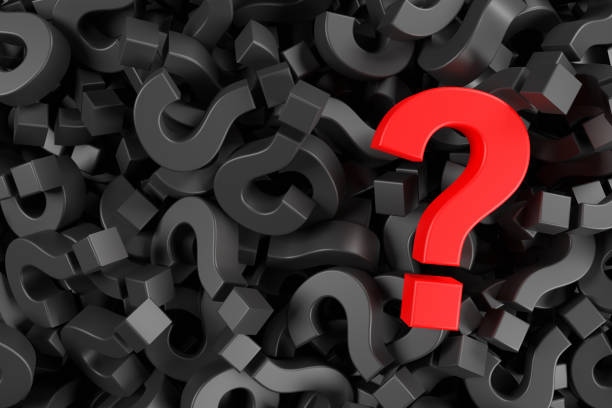 istock Red question mark on a background of black marks. Idea, main question concept. 1338863100