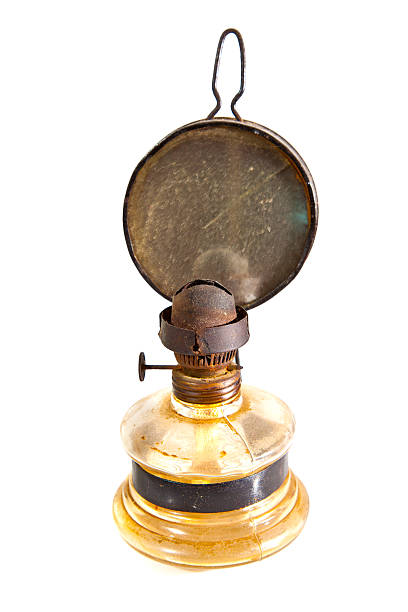 istock Old oil lamp isolated on white 133886750