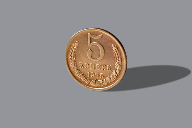 istock Old coin of five soviet (kopecks) penny isolated over white background with reflection 1338874425