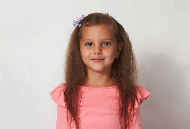 istock Beautiful girl portrait on a white background with copy space 1338874496