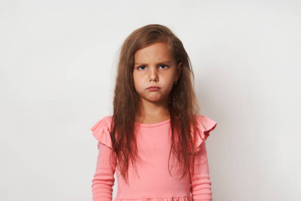 istock Beautiful girl portrait on a white background 1338874586