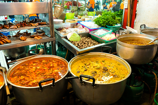 Soup casserole at an open-air street food market.