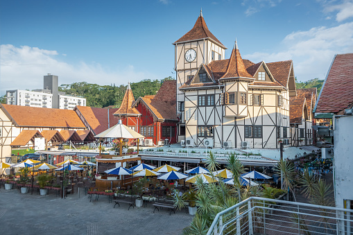 Ystad, Sweden – August 23, 2022: A small town square with tents selling various things on a sunny summer day in Ystad, Sweden.