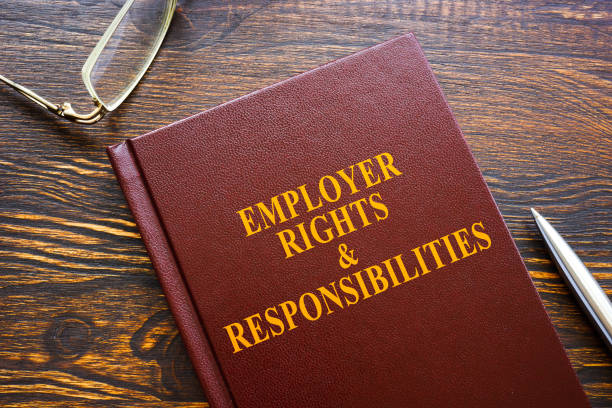 istock Employer Rights and Responsibilities book and glasses. 1338878208