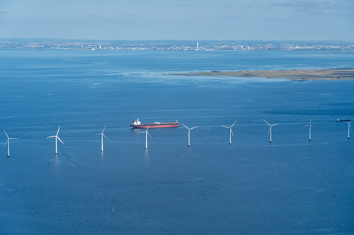 Copenhagen, Denmark - August 21, 2021: Aerial view of Middelgrunden offshore wind power park