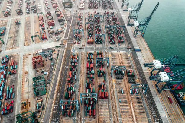 Drone Point View of Busy Industrial Port with Containers Ship