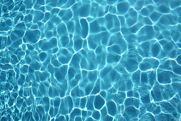 istock Clear blue water in swimming pool 133887949