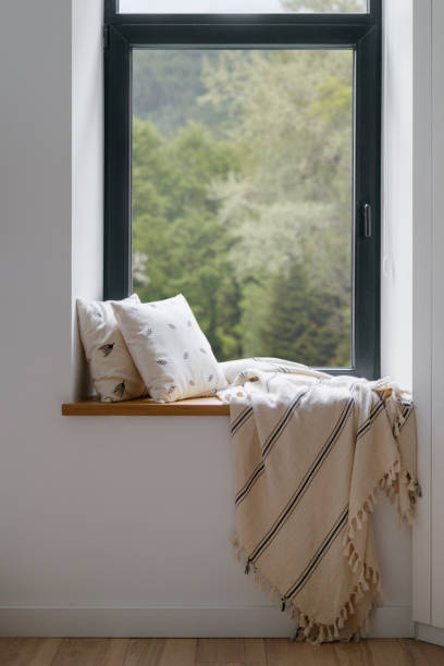 istock Home interior, cozy house room with blanket at window. 1338880051