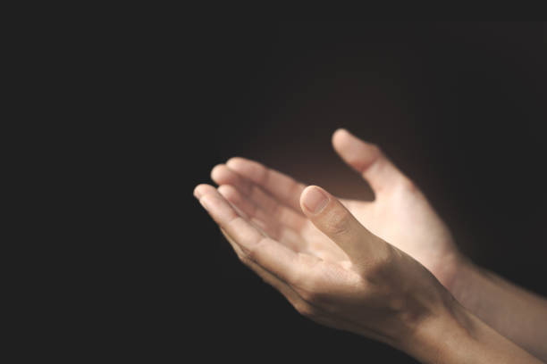 istock Human hands open palm up worship,  Pray for god blessing. 1338880882