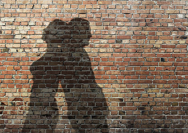 istock shadows of man and woman 133888102