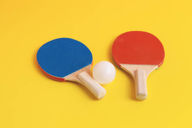 istock Ping pong rackets with white ball. 1338881185