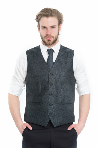 bearded man or serious gentleman in waistcoat and tie isolated on white background, businessman and student, elegance and fashion