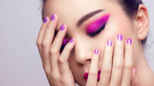 istock Asian female closeup colorful eyeshadow with extreme long false eyelashes. 1338883841