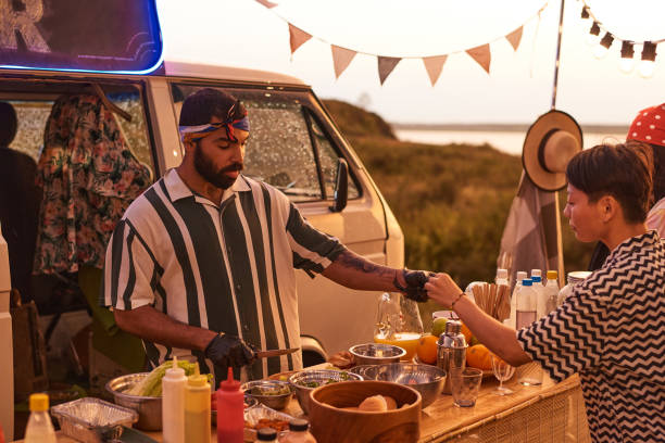 istock Man treating people at a party 1338884963