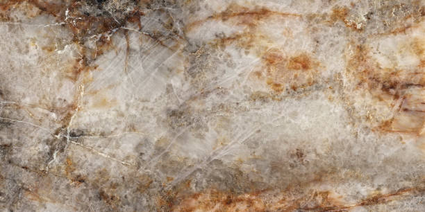фон из натурального мрамора или камня в коричневых тонах с прожилками и насыщенным цветом - textile pattern brown gold стоковые фото и изображения