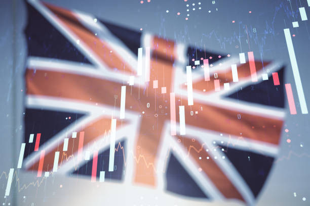 istock Multi exposure of virtual creative financial chart hologram on British flag and blue sky background, research and analytics concept 1338891126