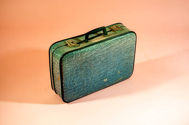istock old vintage dirty suitcase full with memories 1338891377