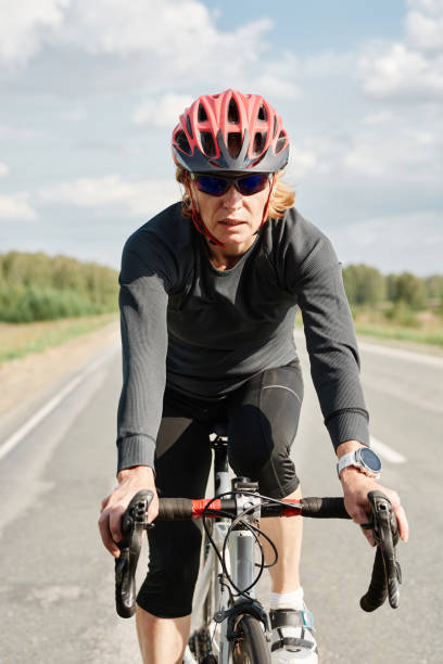 istock Athlete riding on a bike 1338892475