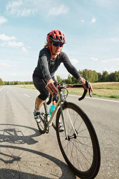 istock Cyclist on mountain road outdoors 1338892521