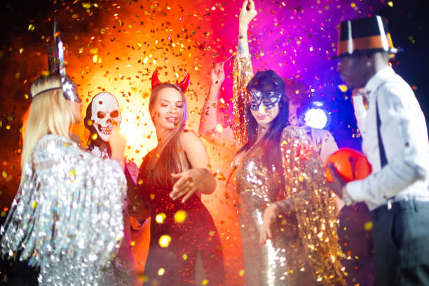 istock People dancing on Halloween party 1338893004