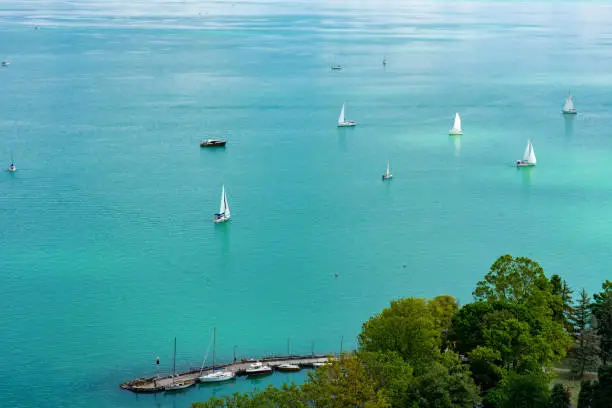 sailing on the lake Balaton with tihany pier view from above .