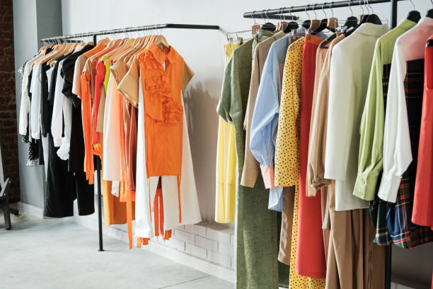 istock Fashion clothes hanging on the rack 1338894673
